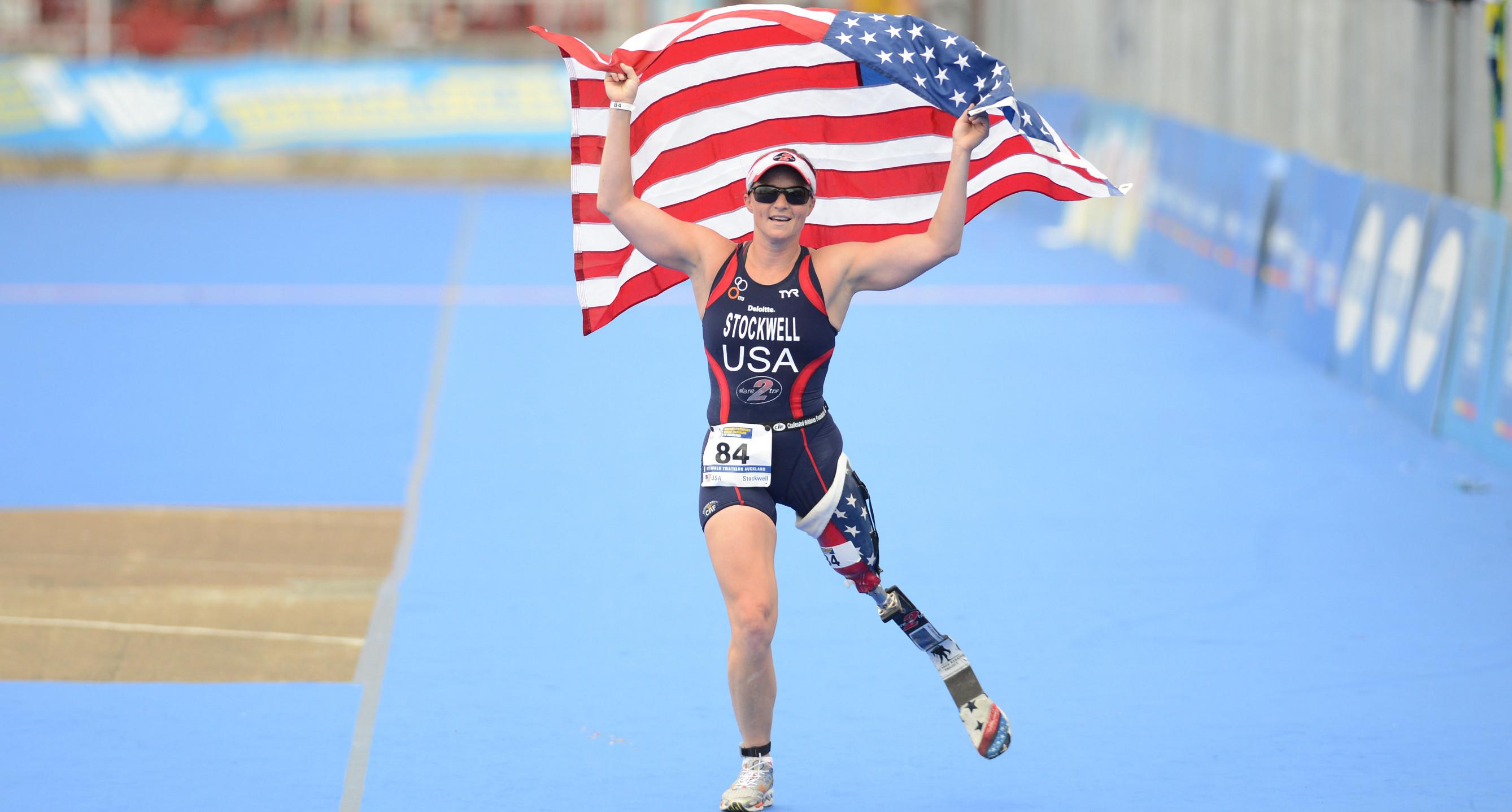 Melissa Stockwell Carries the US Flag